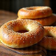 Fresh sesame simit bread on wooden board