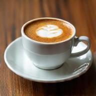 Classic Turkish coffee with foam in porcelain cup